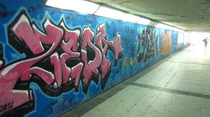Urban art (graffiti) in an underpass to the metro near el Parque del Retiro. Urban art (graffiti) in an underpass to the metro near el Parque del Retiro.