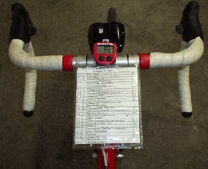 Map Holder 1.0: my first design (circa 2002) was good except that my knees would occasionally graze it when pedaling out of the saddle. (24 Oct 2002) Map Holder 1.0: my first design (circa 2002) was good except that my knees would occasionally graze it when pedaling out of the saddle.