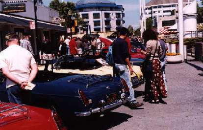 MGB's! MGB's! The well-maintained blue oneis Joe's, and the yellow one, of course,is Goldie. Those people are lookingat her bike rack right now. MGB's! MGB's! The well-maintained blue oneis Joe's, and the yellow one, of course,is Goldie. Those people are lookingat her bike rack right now.