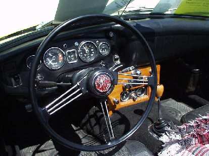 Goldie's interior, featuring the custom wooden center console in which I installed Smiths gauges in January 1997. Goldie's interior, featuring the custom wooden center console in which I installed Smiths gauges in January 1997.