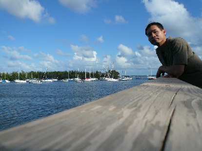 Felix Wong looking over the bay in Coconut Grove, Miami.