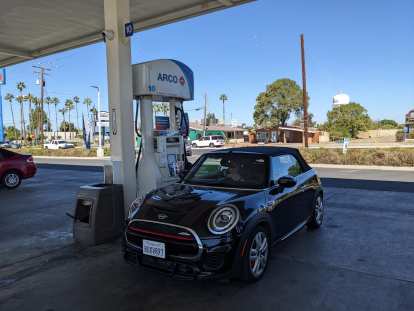 The MINI convertible looked good at the gas station, even with the top up.