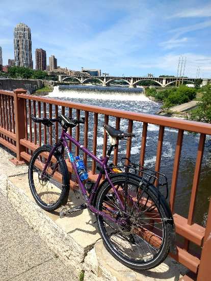 My buddy Dan's purple Surly in front of the Stone Arch Bridge. He generously lent it to me so I could explore Minneapolis while he was at work.
