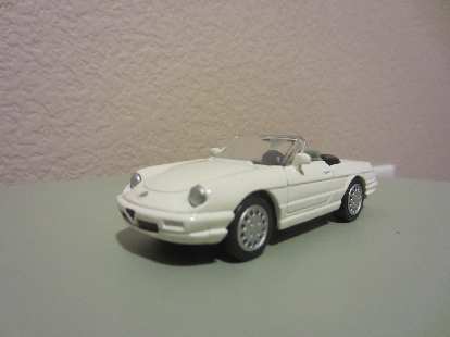 I also found this Alfa Romeo Spider Veloce off ebay. It was white, but I had just enough custom green spray paint (exact color) that I had formerly used as touchup paint for my Alfa.