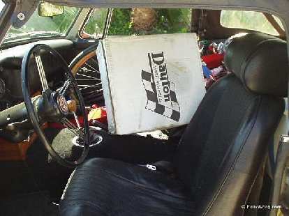 MGB interior, boxes, recumbent bicycle frame inside cabin