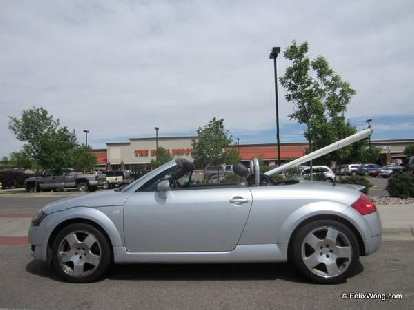 Photo: silver 2001 Audi TT Roadster carrying PVC pipe, Home Depot