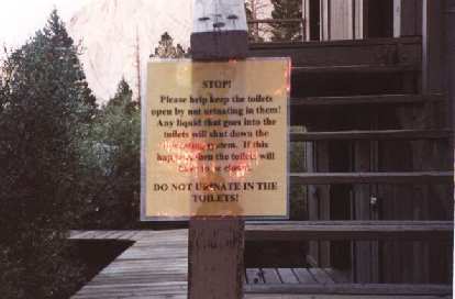 Outpost Camp: "Do not urinate in the [solar] toilets" (!) sign