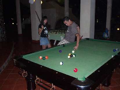 Nam shoots some pool as Kim looks on.  Those two beat me even though Kim refused to take her turns midway through.