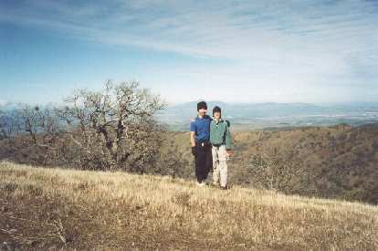 Felix Wong and Sarah on Rose Peak, the highest summit in Alameda County, with Mt. Diablo in the background, the highest summit in Contra Costa County! (27 Jan 2002) Felix Wong and Sarah on Rose Peak, the highest summit in Alameda County, with Mt. Diablo in the background, the highest summit in Contra Costa County!