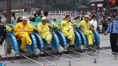 Guys on carriages near the Confucius Temple.