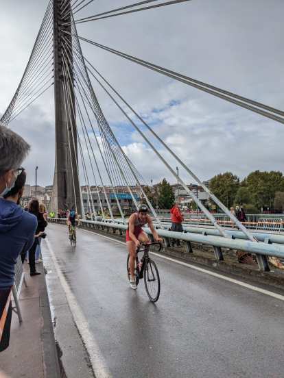 A triathlete on the Puente de los Tirantes during the National Sprint Triathlon Championship in Spain.