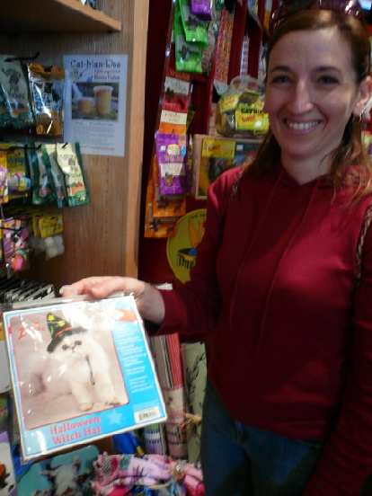 We stopped by a pet shop where Tori promptly found this cat wearing a funny hat.