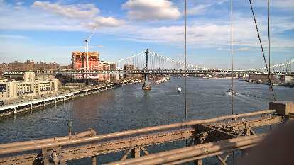 The Manhattan Bridge as viewed from the Brooklyn Bridge. The Manhattan Bridge as viewed from the Brooklyn Bridge.