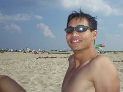 Felix Wong at the nudist beach. Neither he nor Carolyn were one of the completely nude ones. Felix Wong at the nudist beach. Neither he nor Carolyn were one of the completely nude ones.