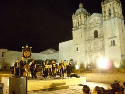 An older choir sang Christmas Carols at La Iglesia de Santo Domingo.