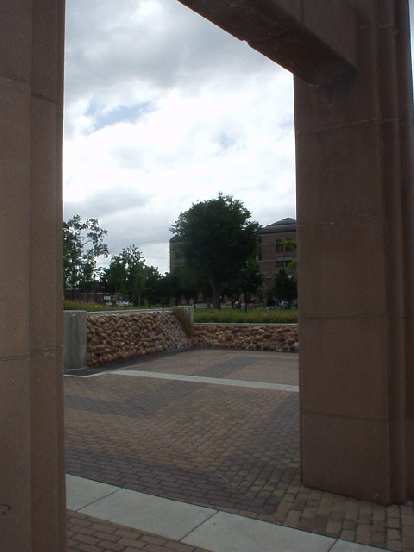 View of downtown through some columns. View of downtown through some columns.