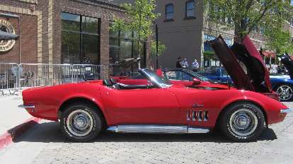 red 1960s Chevrolet Corvette Stingray convertible