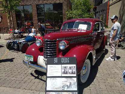 A red 1937 Olds.