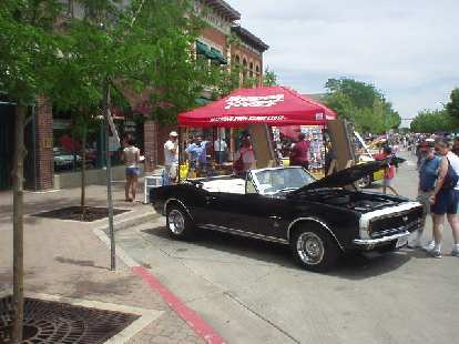 A nicely restored Camaro convertible from the late 60s. A nicely restored Camaro convertible from the late 60s.