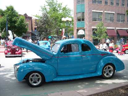 Turquoise hot rod... a Chevy, I think.