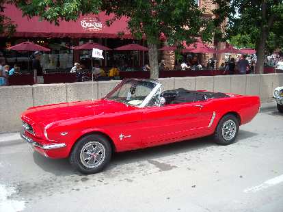 A super red '66 Mustang convertible.