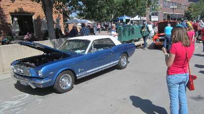 Maureen texting her mom about whether she had a Mustang like this '65. Turns out her mom had a white '66 with a blue interior. Maureen texting her mom about whether she had a Mustang like this '65. Turns out her mom had a white '66 with a blue interior.