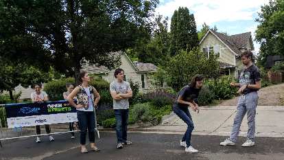 Four folks doing improv at Open Streets.