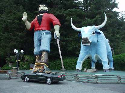 [South of Crescent City, CA] The Alfa meets Paul Bunyan and Babe the Blue Ox.  "Please don't step on me," Elaina thinks.