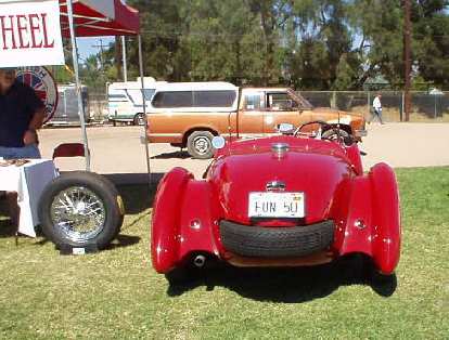 If you can identify this vehicle, can you tell me what it is? That's neat how the spare tire also serves as a bumper! If you can identify this vehicle, can you tell me what it is? That's neat how the spare tire also serves as a bumper!