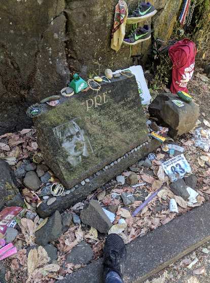 My foot at Pre's Rock, where people pay tribute to Steve Prefontaine even 44 years after his death.