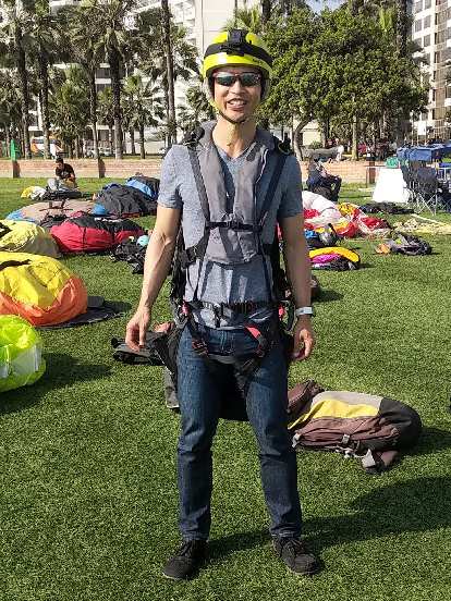 Felix Wong ready to go paragliding in Lima, Peru.