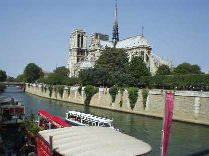 View of the Notre-Dame from the pedestrian bridge just east of it. It took 2 centuries to build the Notre Dame, starting in 1163.. (17 Aug 2003) View of the Notre-Dame from the pedestrian bridge just east of it. It took 2 centuries to build the Notre Dame, starting in 1163..