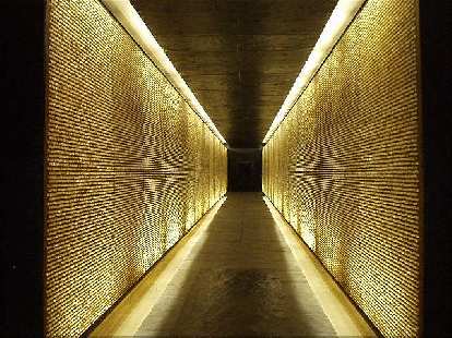 There are 200,000 lighted crystals inside the memorial representing the 200,000 French people who died in the camps. The feeling of claustrophobia here is intentional and symbolic. (17 Aug 2003) There are 200,000 lighted crystals inside the memorial representing the 200,000 French people who died in the camps. The feeling of claustrophobia here is intentional and symbolic.