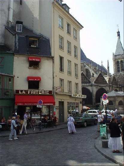 View of La Friterie (no significance other than it's French) from the church of St. Julien-le-Pauvre. Here the concentration of cafes seem to increase. (17 Aug 2003) View of La Friterie (no significance other than it's French) from the church of St. Julien-le-Pauvre. Here the concentration of cafes seem to increase.