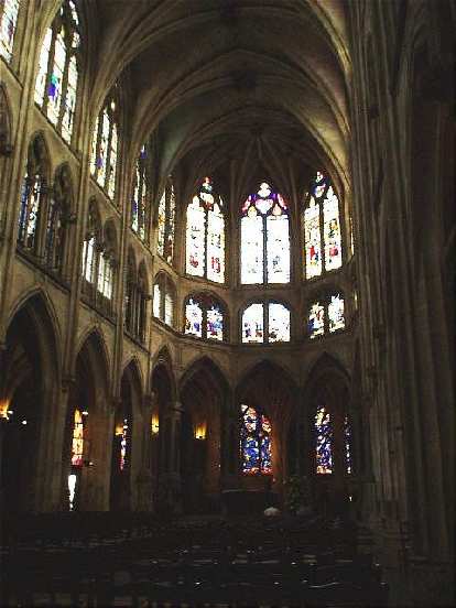 I spent half an hour of peace and solitude inside the church of St. Severin, which (with its exquisite glass work) took a century longer than the Notre Dame to build! (17 Aug 2003) I spent half an hour of peace and solitude inside the church of St. Severin, which (with its exquisite glass work) took a century longer than the Notre Dame to build!