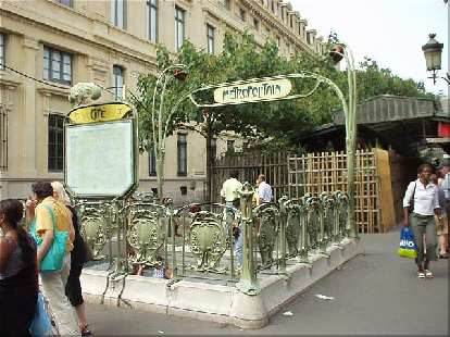 An example of Art Nouveau at the Metro entrance near the Palais de Justice. You got to love a country where even something as mundane as a subway entrance qualifies as art! (17 Aug 2003) An example of Art Nouveau at the Metro entrance near the Palais de Justice. You got to love a country where even something as mundane as a subway entrance qualifies as art!