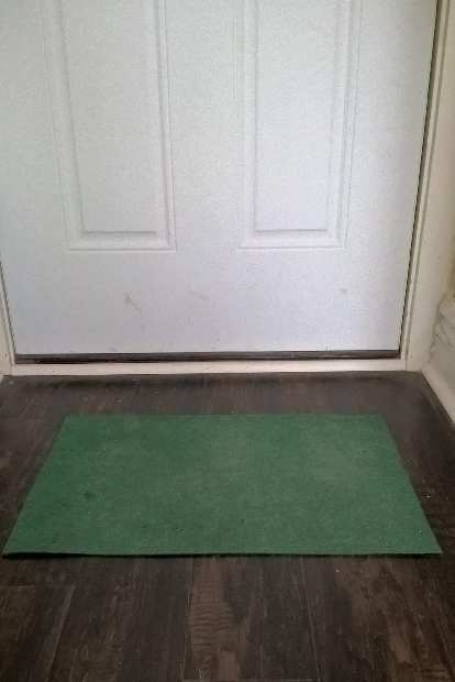 green $1 doormat