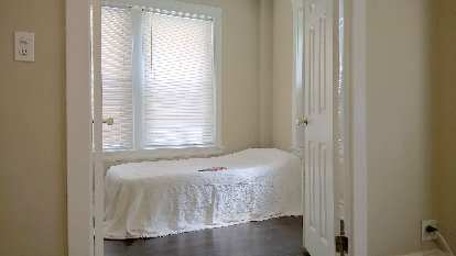 minimalist bedroom; white twin airbed