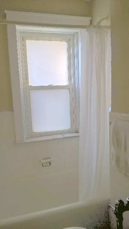 minimalist bathroom, white shower curtain, white towel