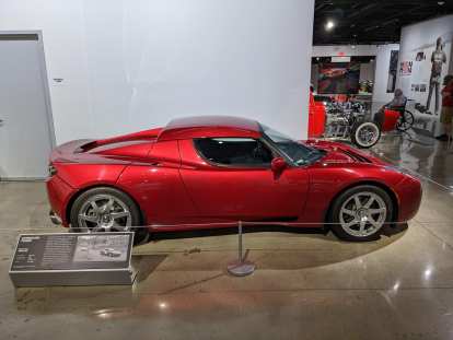 A red 2008 Tesla Roadster.