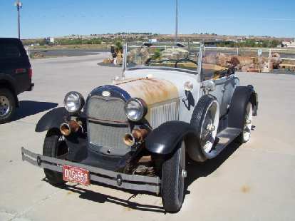 An antique car. An antique car.