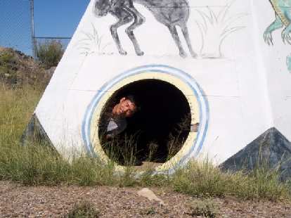 Felix Wong inside a teepee. Felix Wong inside a teepee.