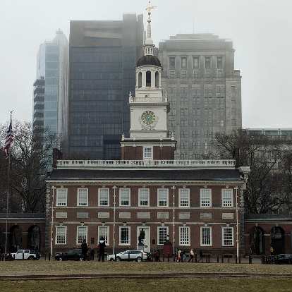 In front of Independence Hall is a statue of George Washington.