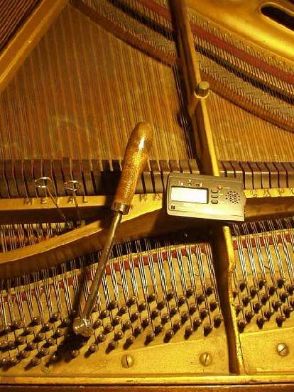 The first thing I did was tune the piano.  Each key was flat by about 40 Hz!