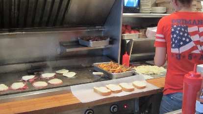 Making 'Burgh-famous sandwiches at Primanti Bros.