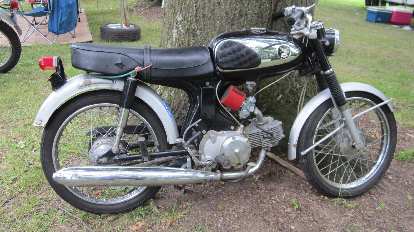 Vintage motorcycle (I do not know the marque). Vintage motorcycle (I do not know the marque).