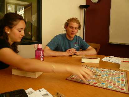 Anna makes her move in French Scrabble as Jurian looks on. (14 May 2008) Anna makes her move in French Scrabble as Jurian looks on.