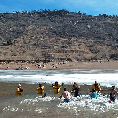 Submerging into the Horsetooth Reservoir at the 2019 Polar Bear Plunge. Photo: Tammi Glick. Submerging into the Horsetooth Reservoir at the 2019 Polar Bear Plunge.