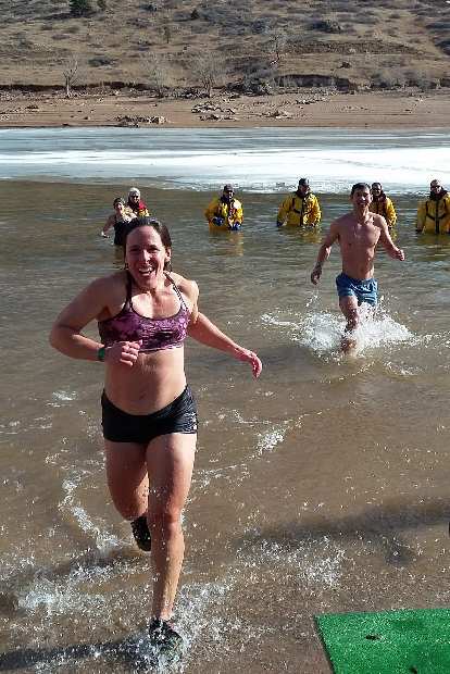 Jennifer and Felix emerging from the Horsetooth Reservoir at the 2019 Polar Bear Plunge. 