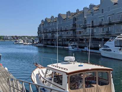 Boats docked by the piers in downtown Portland, Maine.